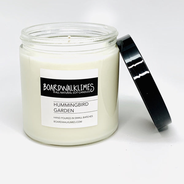 16 oz luxury floral soy candle in modern clear glass jar with shiny back lid