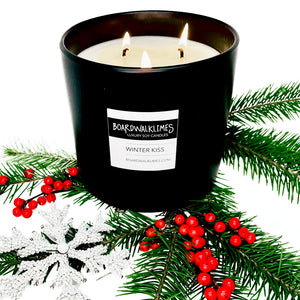 The best winter candle with 3 wicks in a black handmade ceramic vase is filled with pine, eucalyptus, winter cranberries and sweet apple.