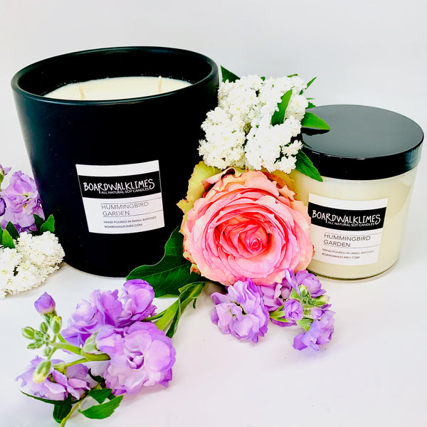 Luxury floral scented soy candles and essential oil diffuser oil in rose, lilac, and gardenia fragrances