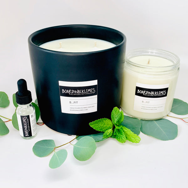 3-wick large luxury soy candle in an handmade matte black ceramic vase,16oz Soy candle in a glass jar with a shiny black lid both in an invigorating and energizing scent