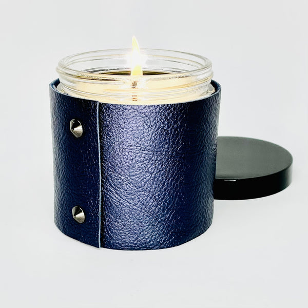 Luxury Soy Candle in a designer metallic sapphire leather sleeve with 2 black studs