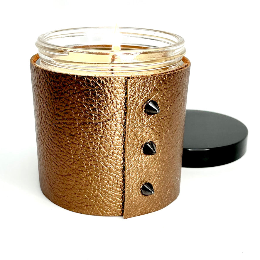 Luxury Soy Candle in a designer metallic bronze leather wrap with 3 cone shaped black studs