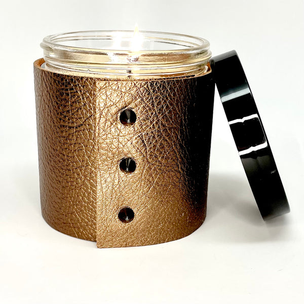 Luxury Soy Candle in a designer metallic bronze leather wrap with 3 cone shaped black studs