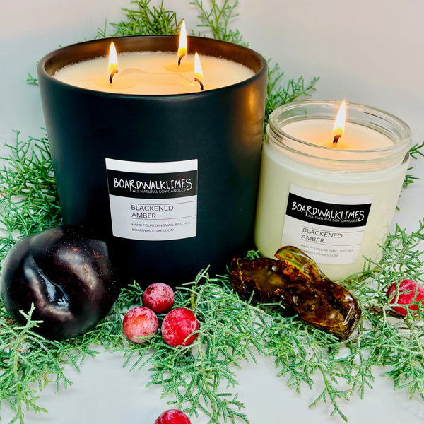 Luxury soy candles with evergreen, plum and amber scented fragrances