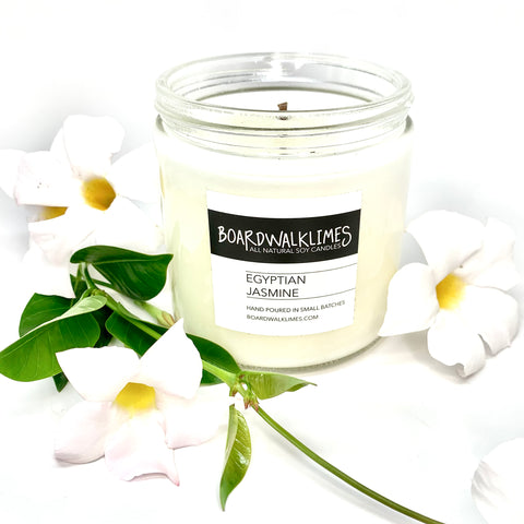 Jasmine and citrus fragrances in a 16 oz luxury soy candle in modern clear glass jar with shiny back lid