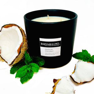 Luxury large 3-wick soy candle in coconut and sweet mint fragrances in a handmade black ceramic vase