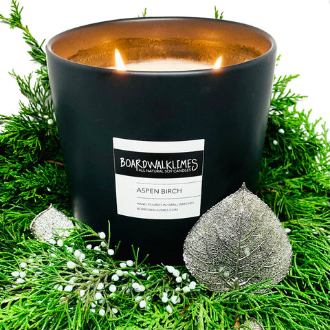 Luxury large soy candle with 3 wicks in Aspen evergreen fragrances in aa handmade black ceramic vase