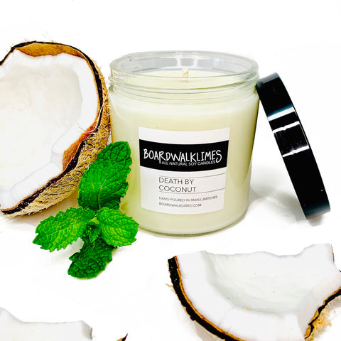 Smooth coconut with a hint of mint soy candle in a glass jar with a shiny black lid