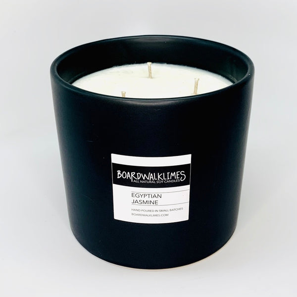 3-wick high end soy candle in a handmade matte black 5" ceramic vase