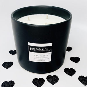 Luxury coffee table sized 3-wick soy candle in handmade ceramic matte black vase with a sexy male cologne scent
