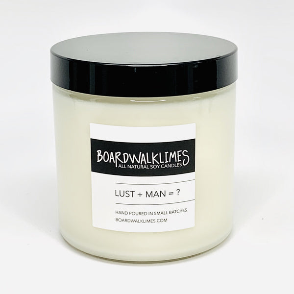 16 oz luxury soy candle in modern clear glass jar with shiny back lid with a sexy fragrance